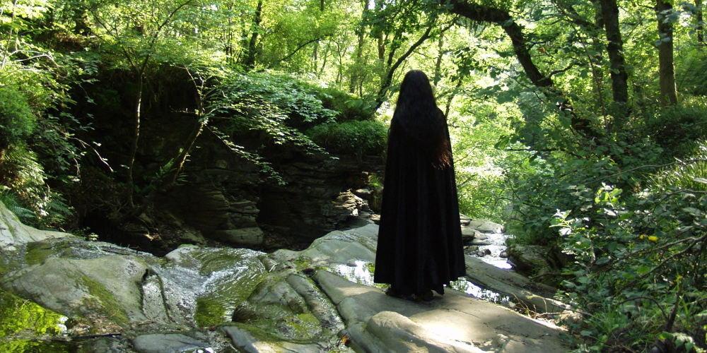 An image entitled Witch Stands, Water Falls.